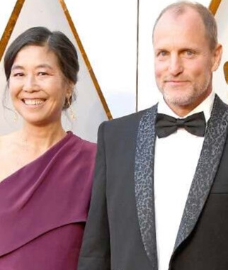 Laura Louie with her husband Woody Harrelson